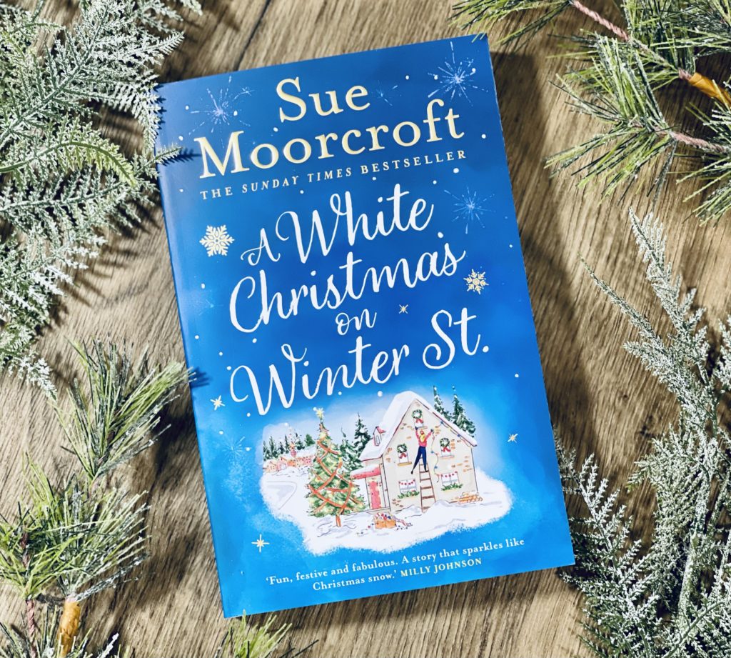 A White Christmas on Winter St by Sue Moorcroft with Foliage
